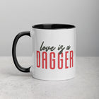 LOVE IS A DAGGER Mug with Color Inside
