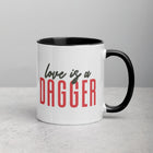 LOVE IS A DAGGER Mug with Color Inside