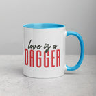 LOVE IS A DAGGER Mug with Color Inside