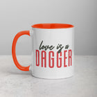LOVE IS A DAGGER Mug with Color Inside