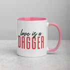 LOVE IS A DAGGER Mug with Color Inside