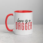 LOVE IS A DAGGER Mug with Color Inside