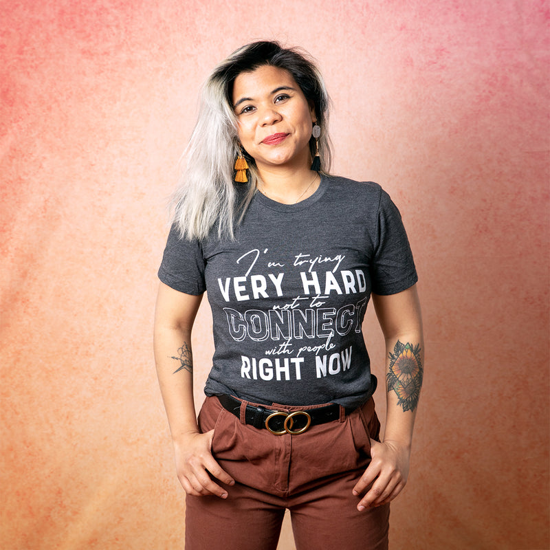 TRYING VERY HARD NOT TO CONNECT Unisex T-Shirt