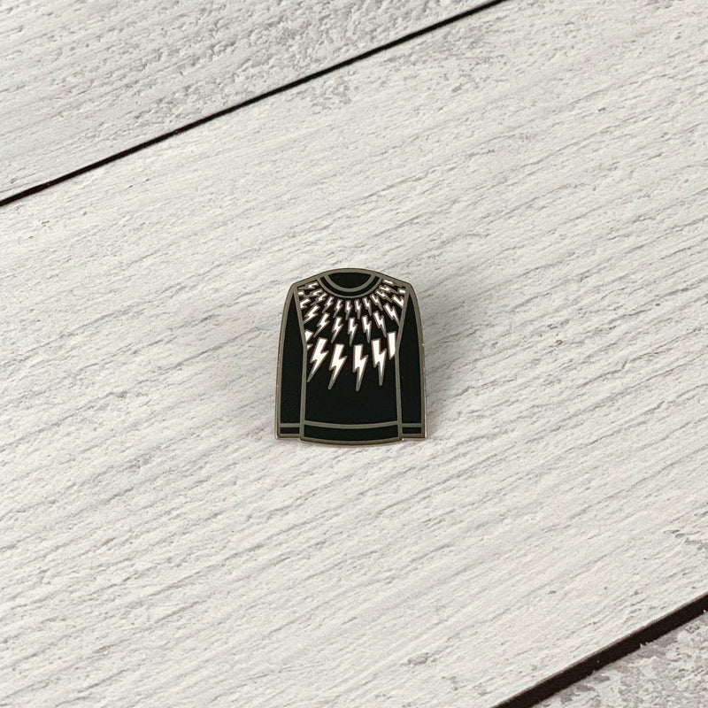 David's Sweater Collection lapel pin