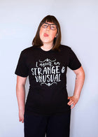 STRANGE & UNUSUAL Unisex T-shirt