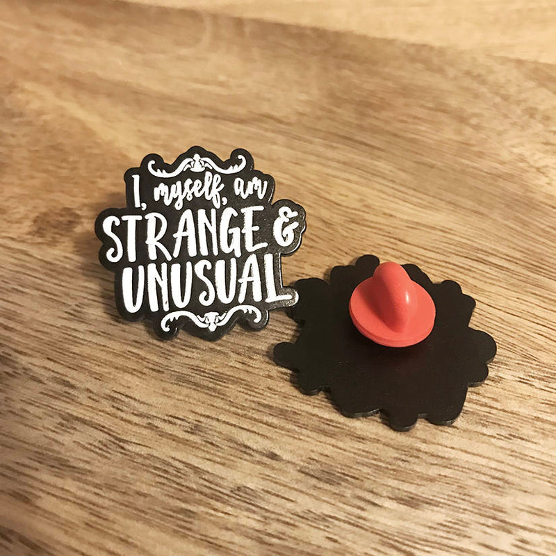 STRANGE and UNUSUAL lapel pin