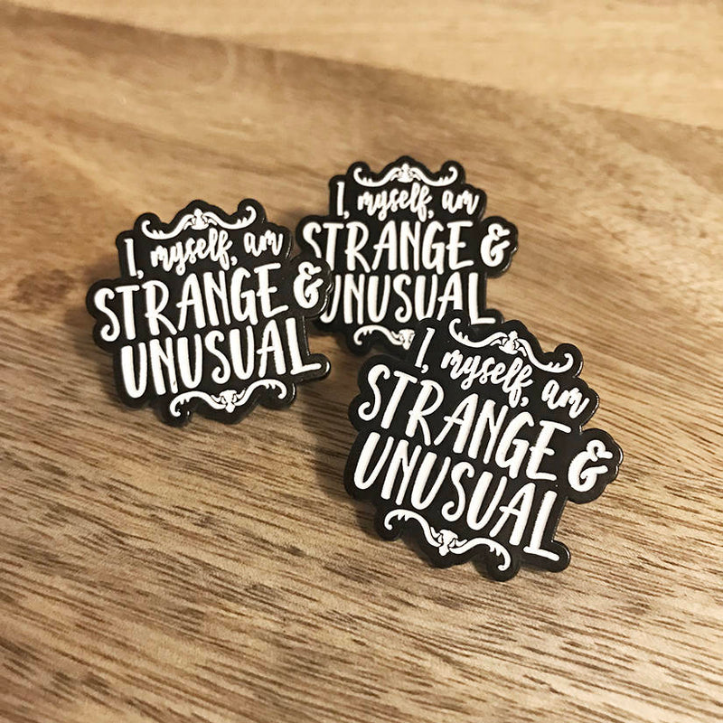 STRANGE and UNUSUAL lapel pin