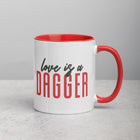 LOVE IS A DAGGER Mug with Color Inside